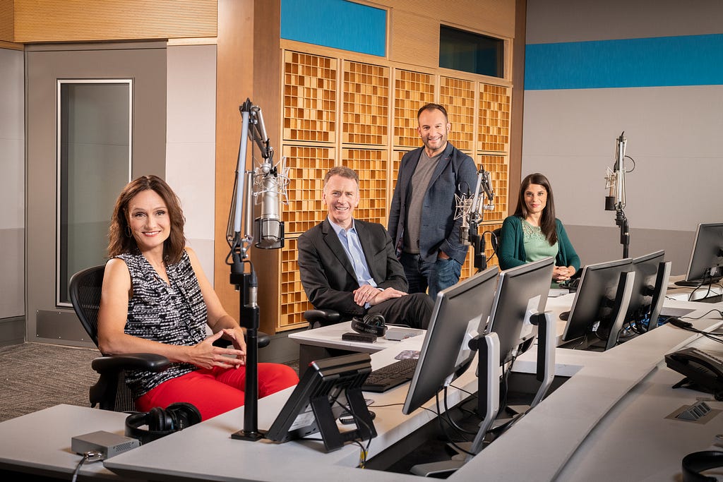The four hosts of Morning Edition sit in the recording studio.