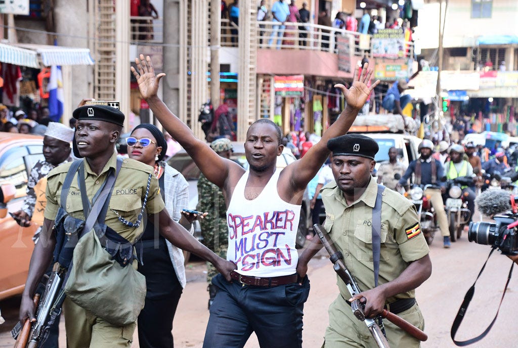 Ugandan youth arrested as he marches to Parliament during a protest