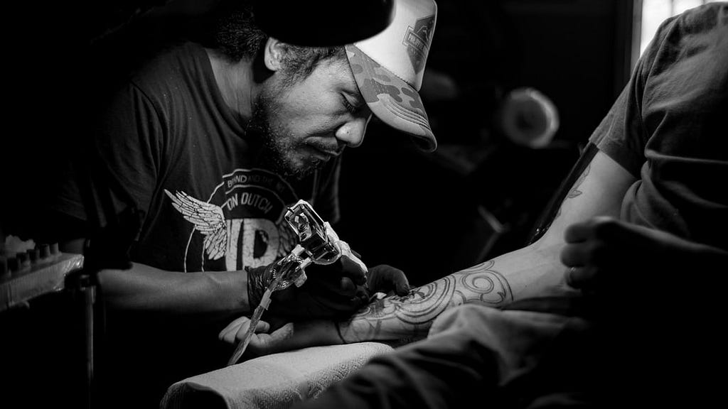Male tattoo artist