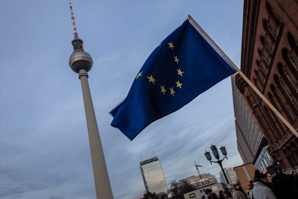 EU flag waving in front of Berlin’s TV tower.