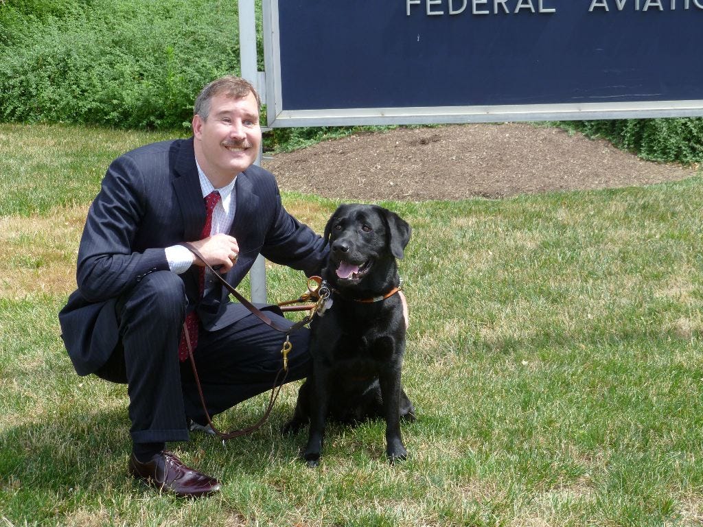 Barry and and his former guide dog Jet