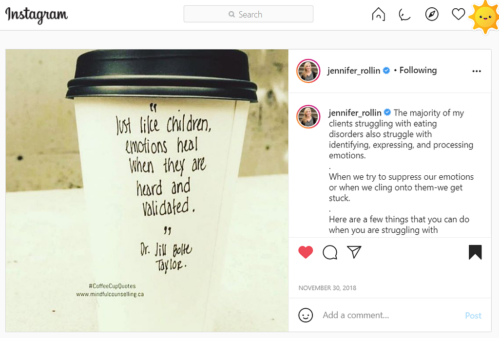 A screenshot of an Instagram post in it is a disposible white paper coffee cup with a black plastic lid.