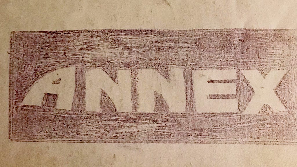 The word “Annex” drawn by hand, photo of the actual publication cover created by students