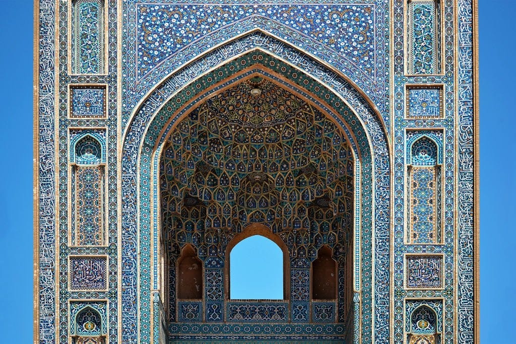 Beautiful Jameh Mosque in Yazdu, Iran, detail of a mosque muqarnas and tiles decoration