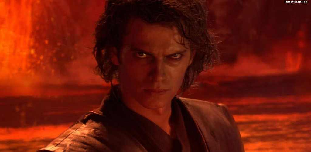 Close-up of Anakin Skywalker on Mustafar during his fight with Obi-Wan. He is angry and full of hate as he battles the man who raised him.