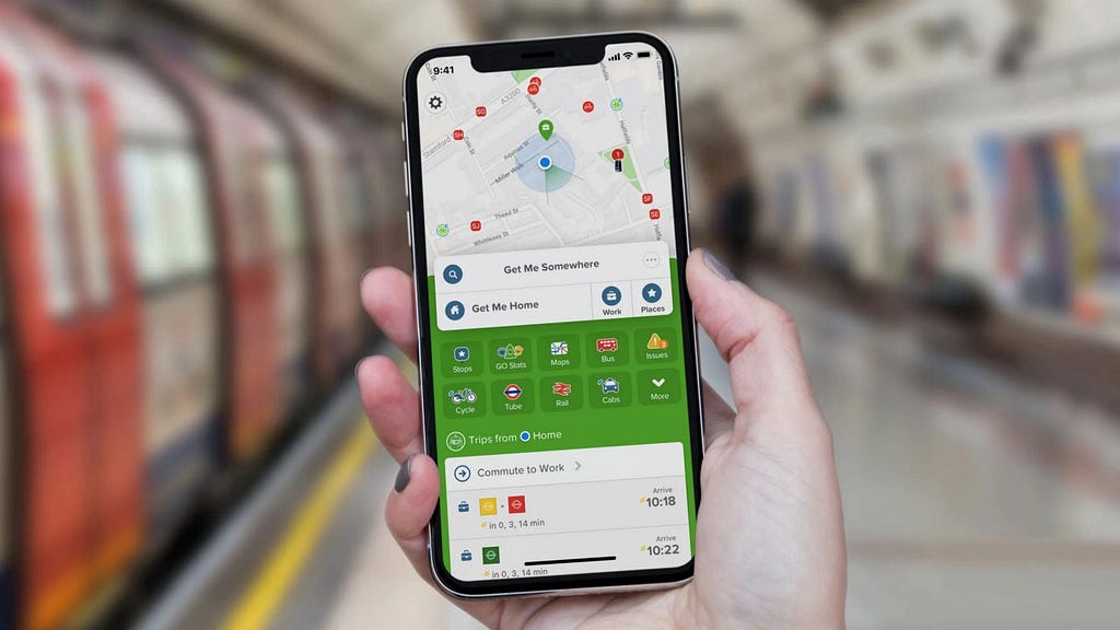 Hand holding a smartphone with Citymapper in a metro station.