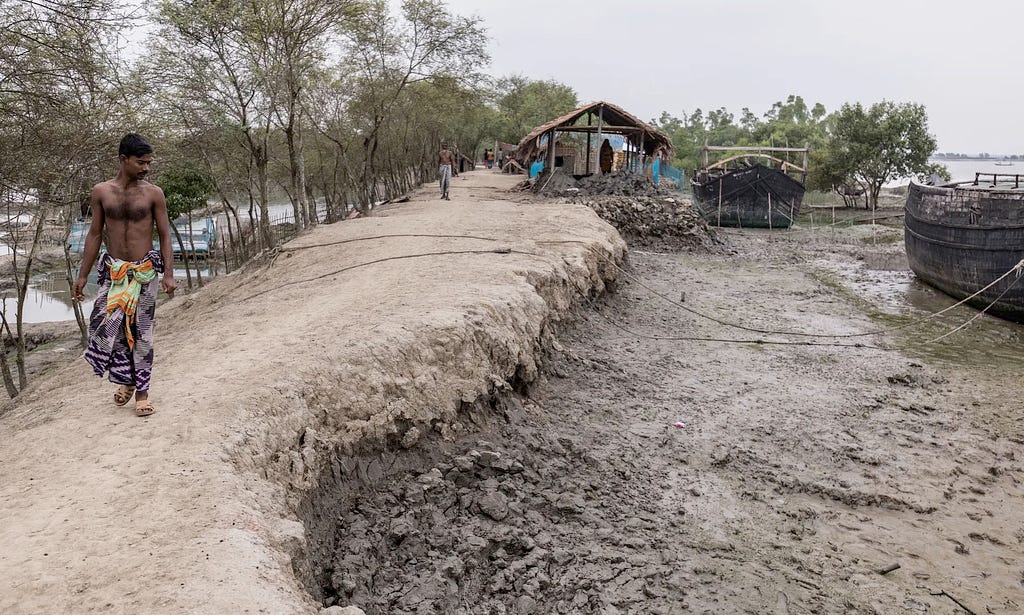 With ever high tide due to the sea level rise, the embankments that protect coastlines in Shymanagar, Satkhira in Southern Bangladesh are further eroded. Photo: Environmental Justice Foundation