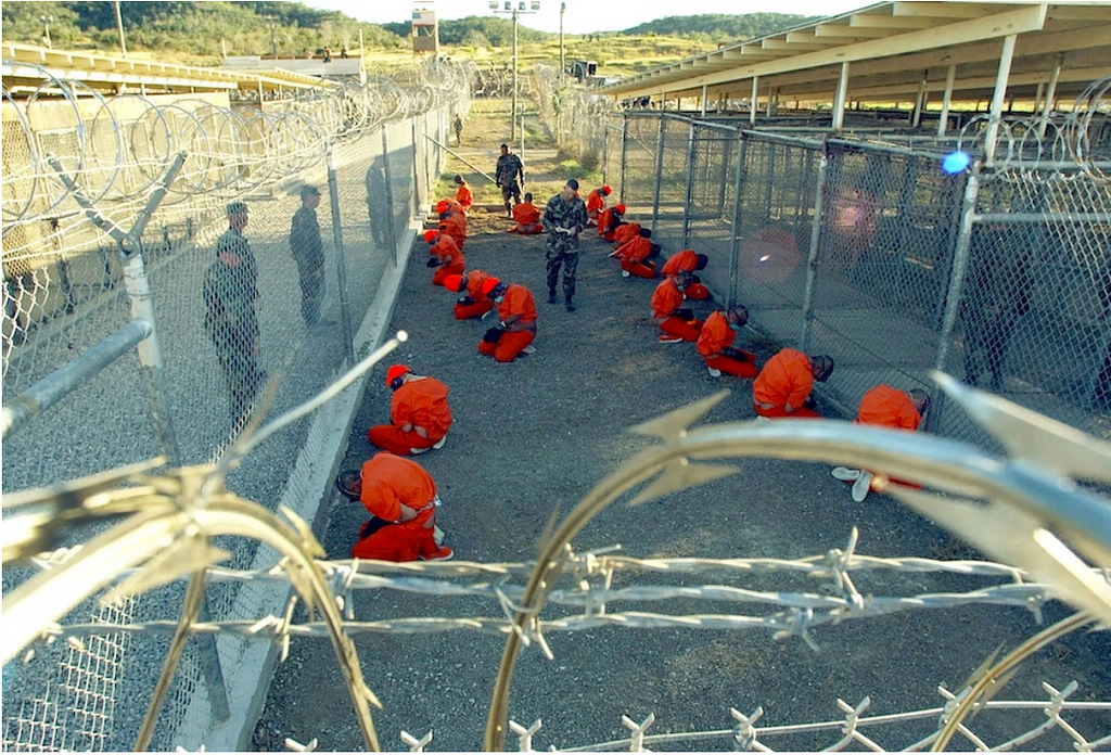 Picture taken by: Petty Officer First Class Shane T. McCoy/U.S. Navy. January 11, 2002. Picture derived from: Guantanamo Bay NYT. The Pentagon photos.