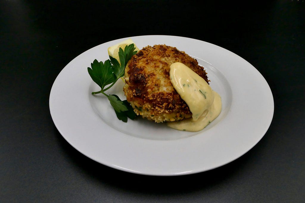 Crab cake nicely plated
