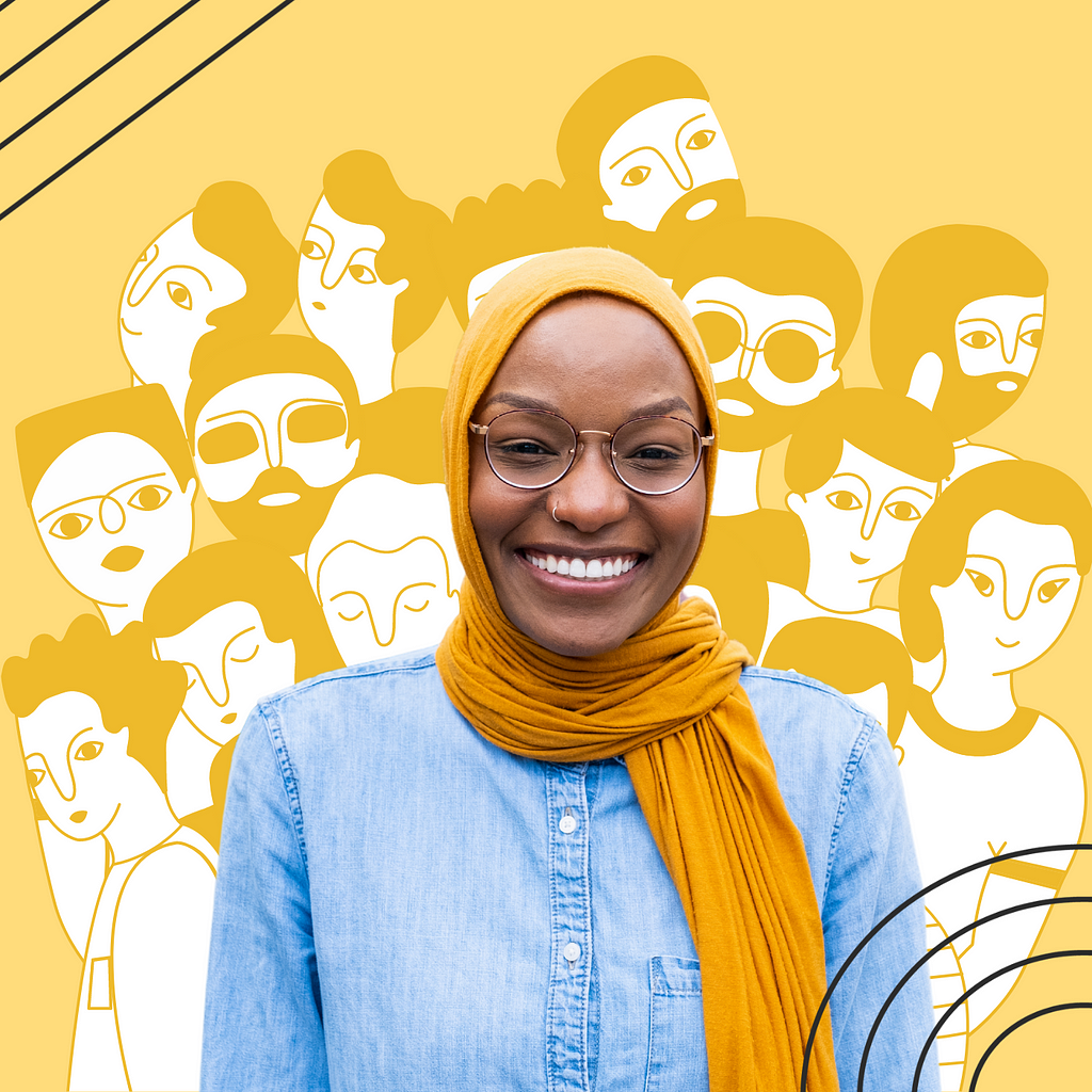 A picture of Baiyinah Brookins in front of a yellow mural of people’s faces.