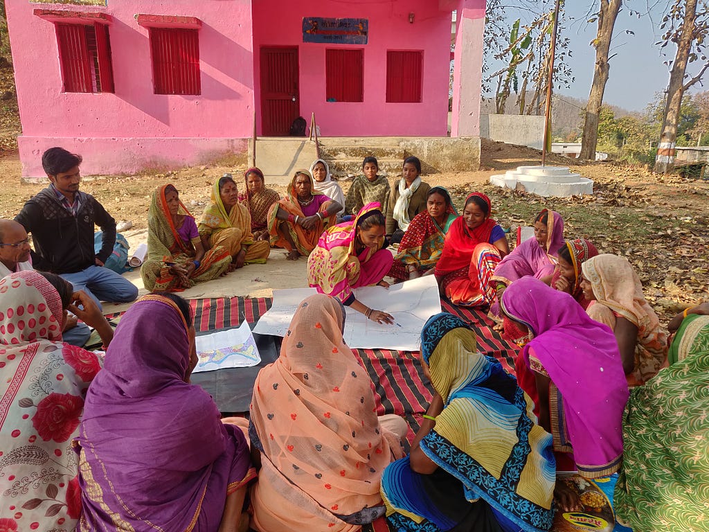 Sonubal with the women leading the agenda & planning for village development projects.