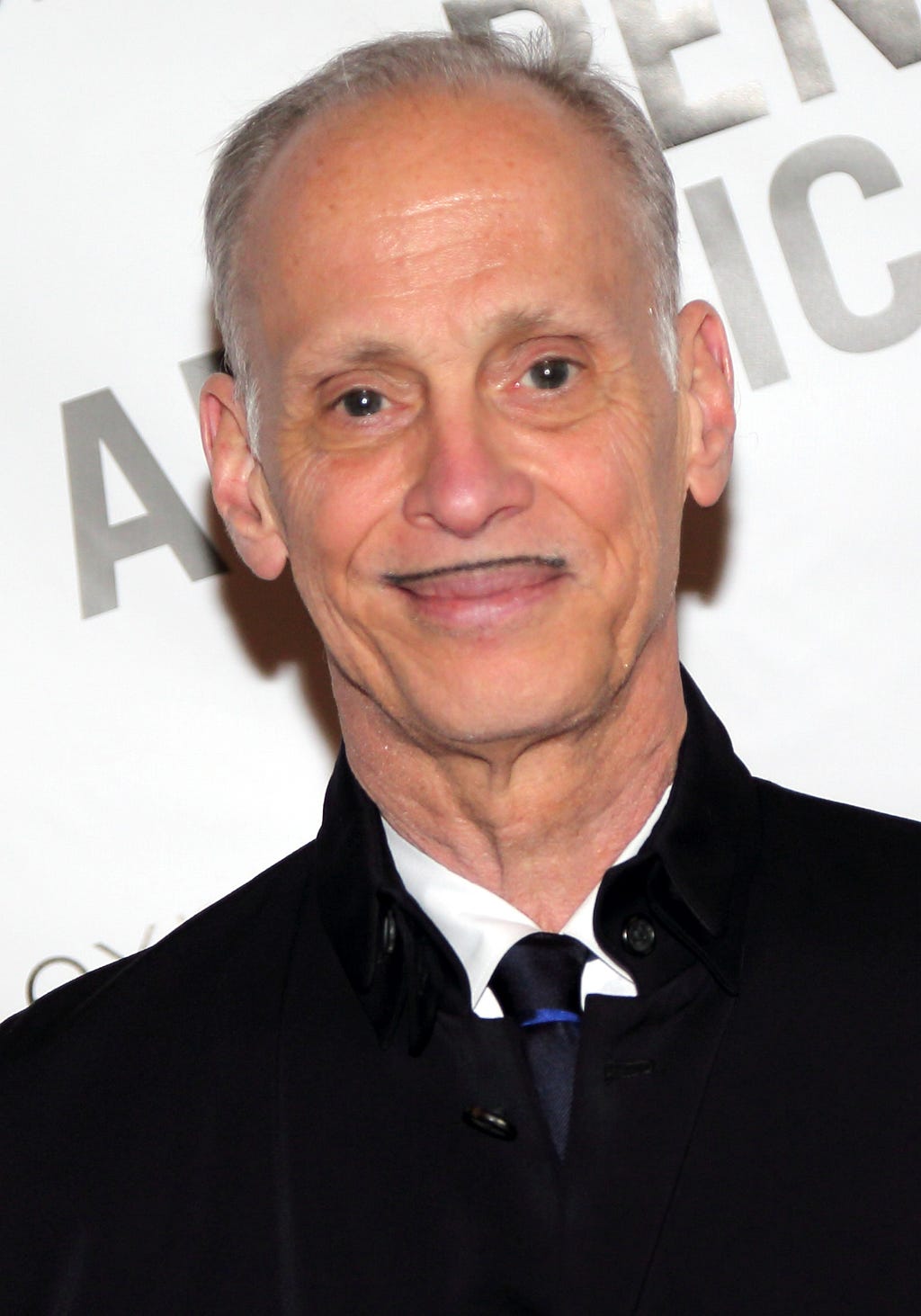 John Waters — By PEN American Center — https://www.flickr.com/photos/penamericancenter/13944944999/, CC BY 2.0, https://commons.wikimedia.org/w/index.php?curid=33735824