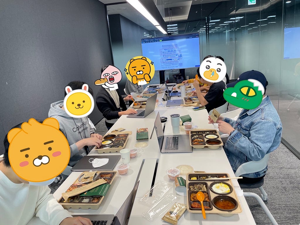 AI Researchers from the Cancer Screening Department in a typical MedOps study session (with free lunch!)