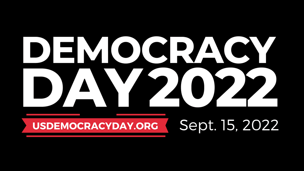 The words “Democracy Day 2022” appear in all capital letters on a black background. Beneath is the website usdemocracyday.org highlighted in a red banner next to the date, Sept. 15, 2022.