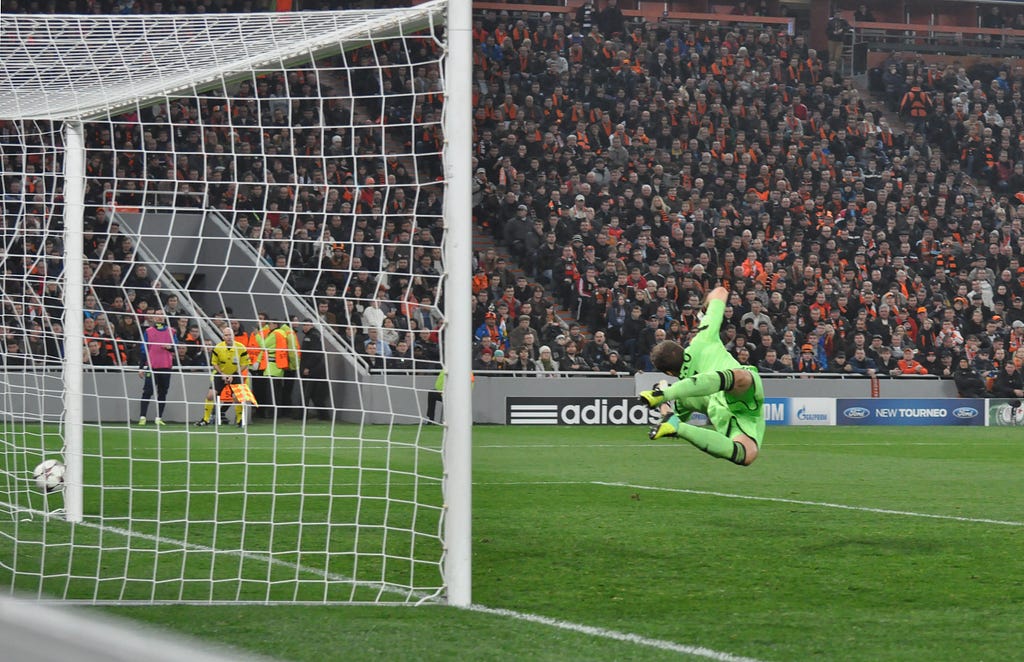 A goalkeeper missing a save during a Champions’ League game between Shakhtar Donetsk and Bayern Leverkusen in 2013.