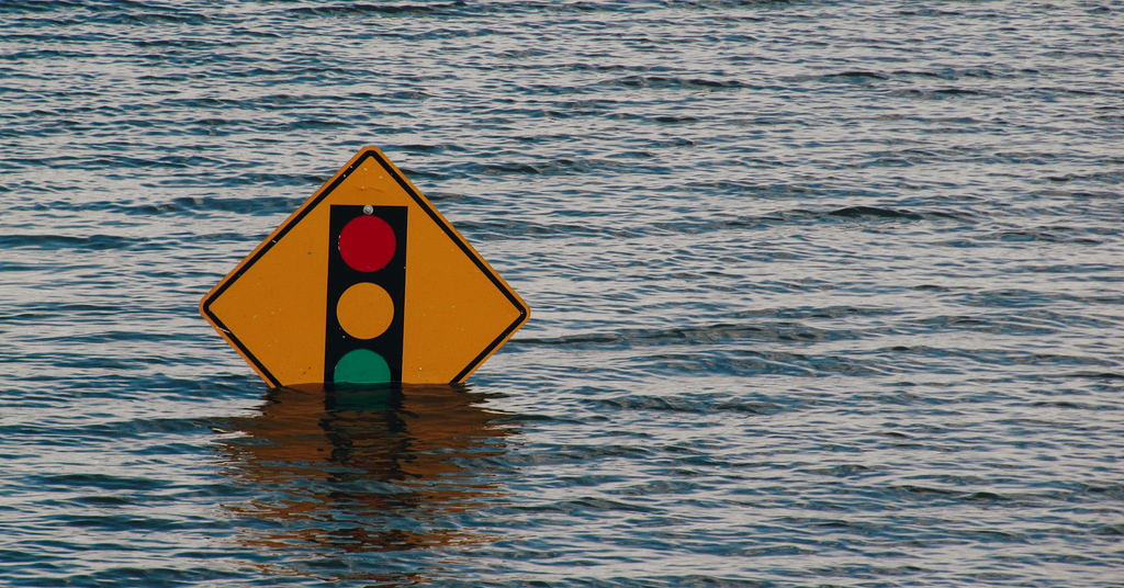 Traffic sign under water by Kelly Sikkema