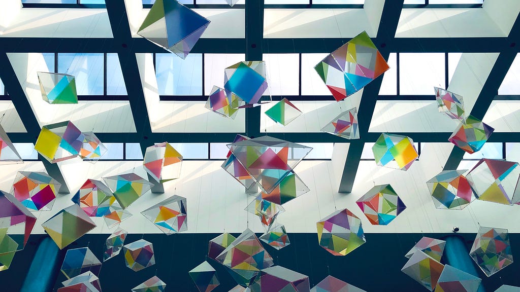 Colorful cubes hanging from ceiling