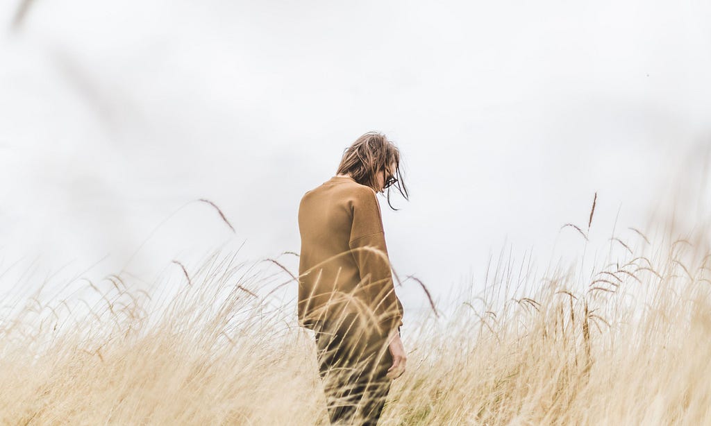 Woman walking in a field