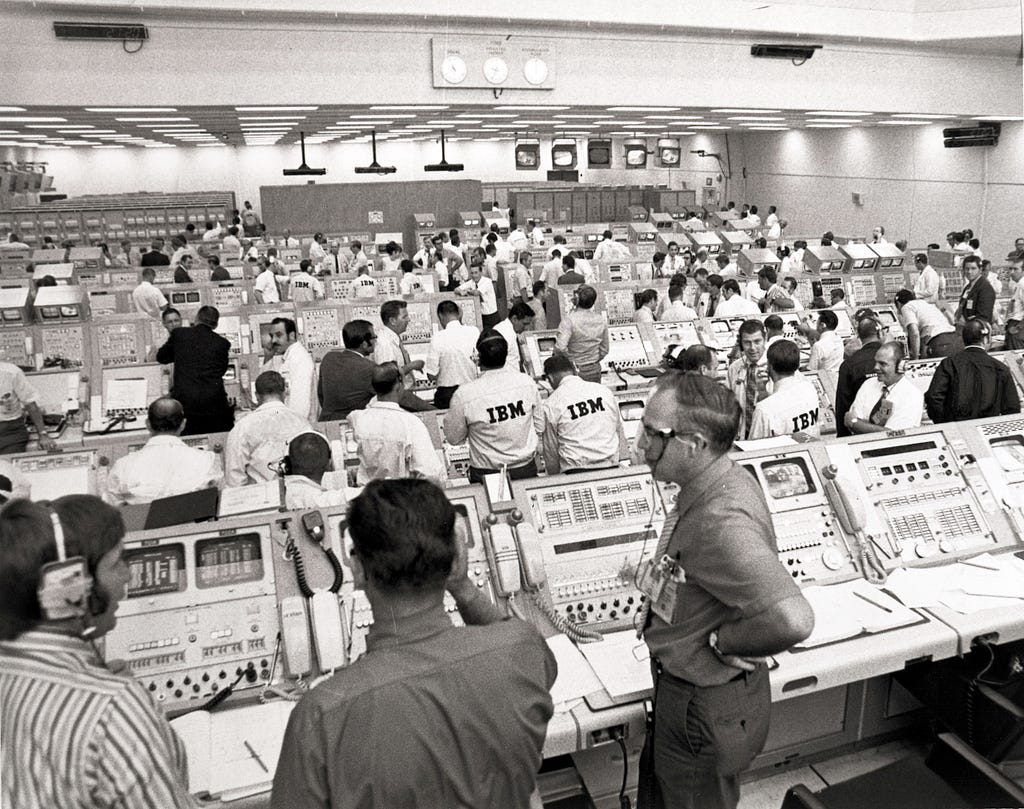 NASA control room with IBM technical staff