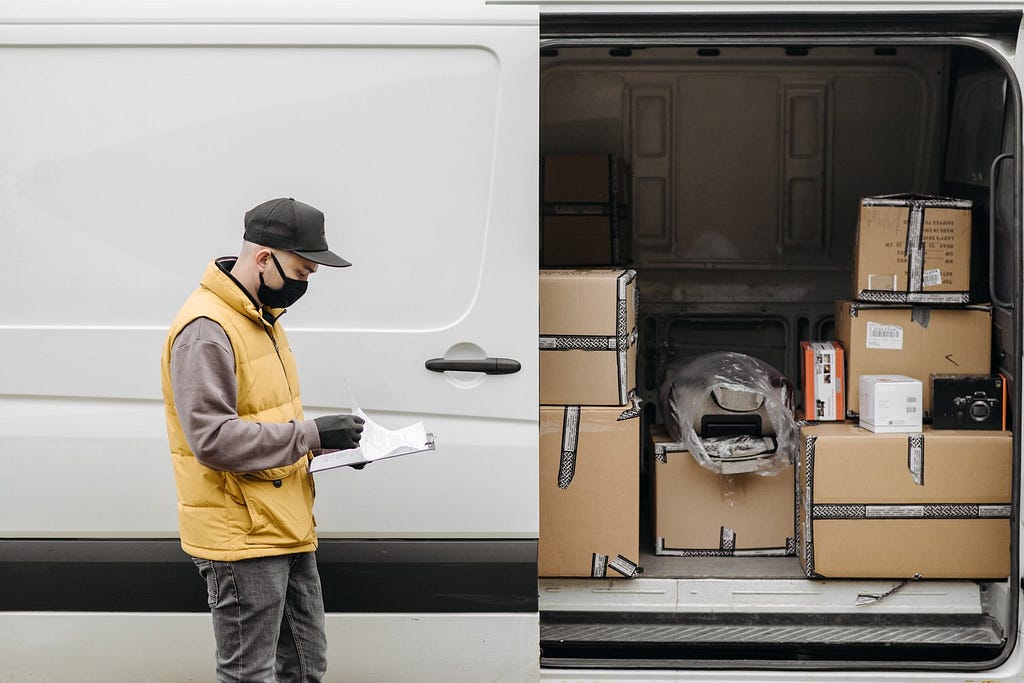 A white-glove deliveryman fulfills orders from a company-provided checklist. Certain products require added care at final delivery.