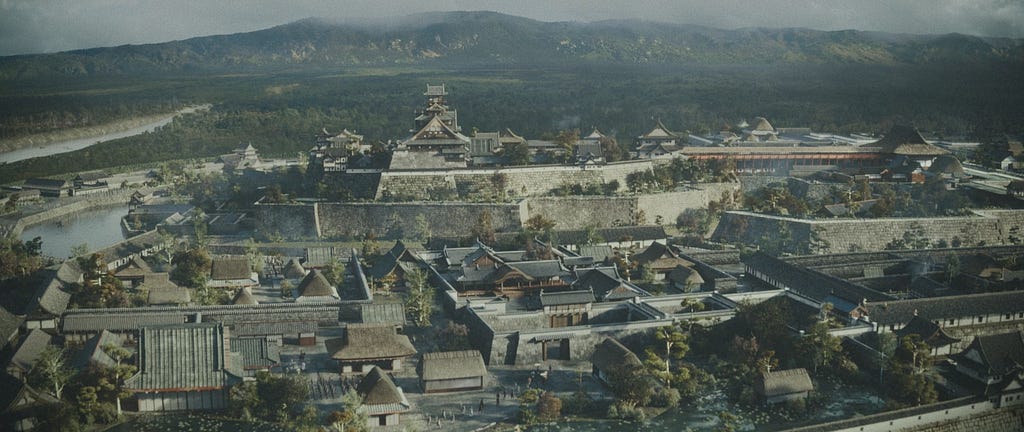 A screencap from the mini-series showing an aerial shot of the Osaka Castle.