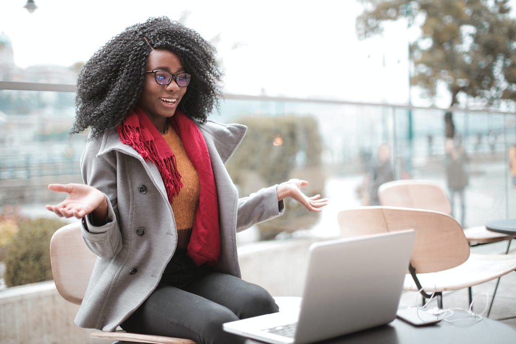 Photo by Andrea Piacquadio: https://www.pexels.com/photo/cheerful-surprised-woman-sitting-with-laptop-3762940/