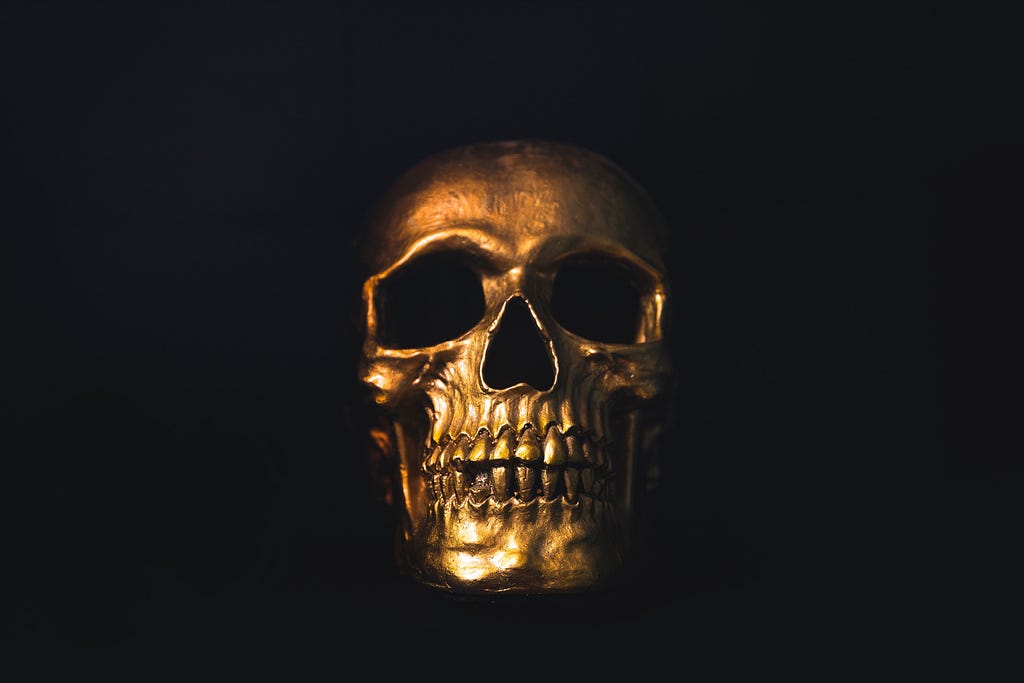 Golden Skull Photo by Luke Southern on Unsplash