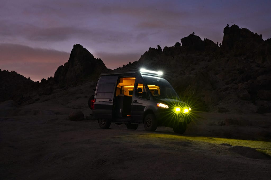 Mercedes Sprinter camper in dark with lights