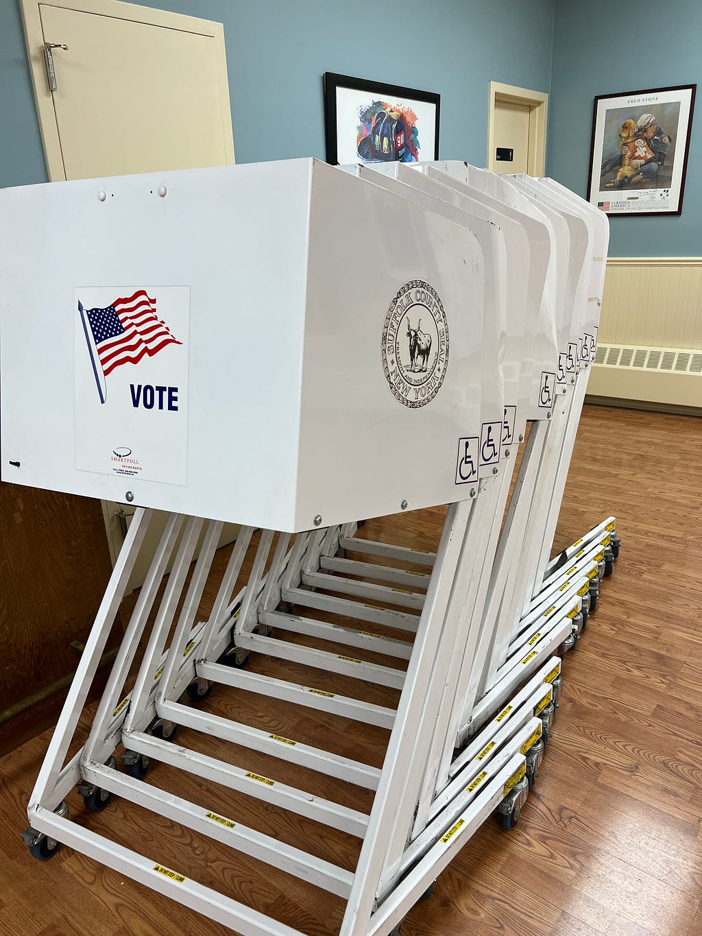 Voting privacy booths stacked up at a polling place