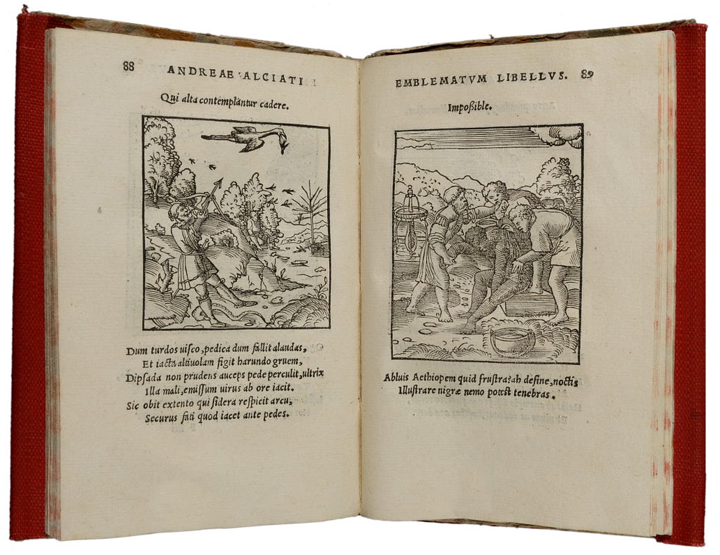 Pages from a book of woodcuts. The woodcut on the right shows a group of white men trying to wash the color from a Black man.