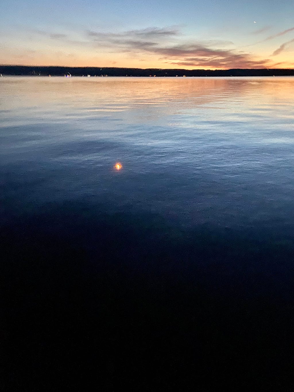 candle flame on Seneca Lake
