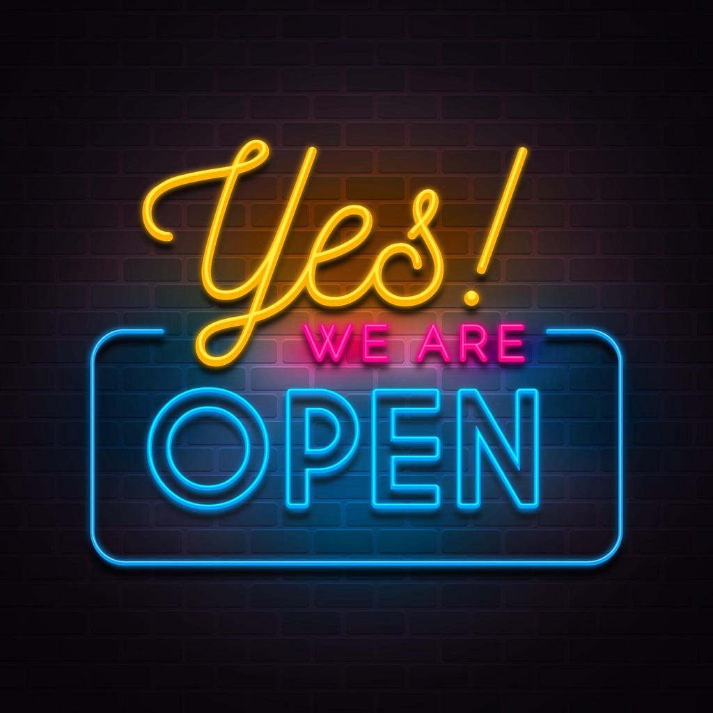 An illustration that looks somewhat like a neon sign that reads “Yes! WE ARE OPEN.”