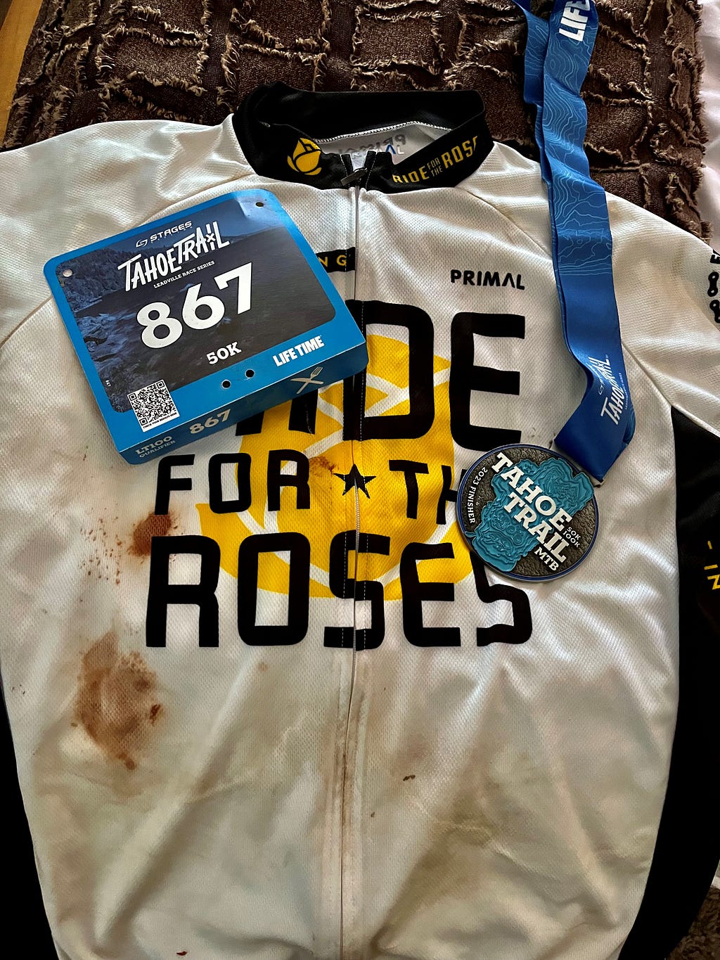 Cycling number, cycling race bib, and finisher’s medal