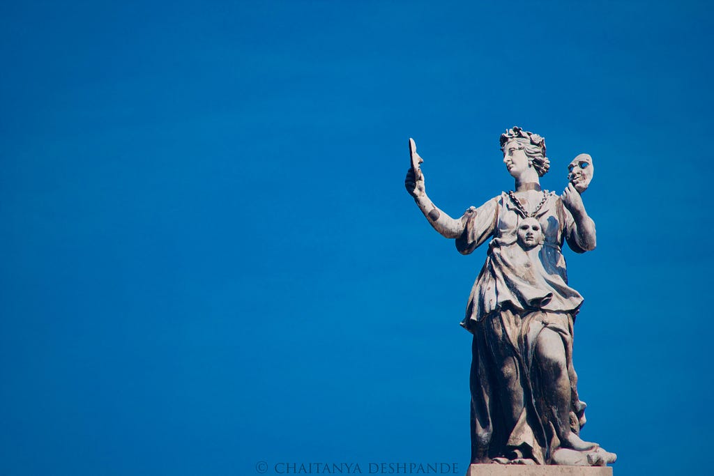 Either Melpomene or Thalia, the muses of tragedy and comedy atop the Old Clarendon Building, Oxford.