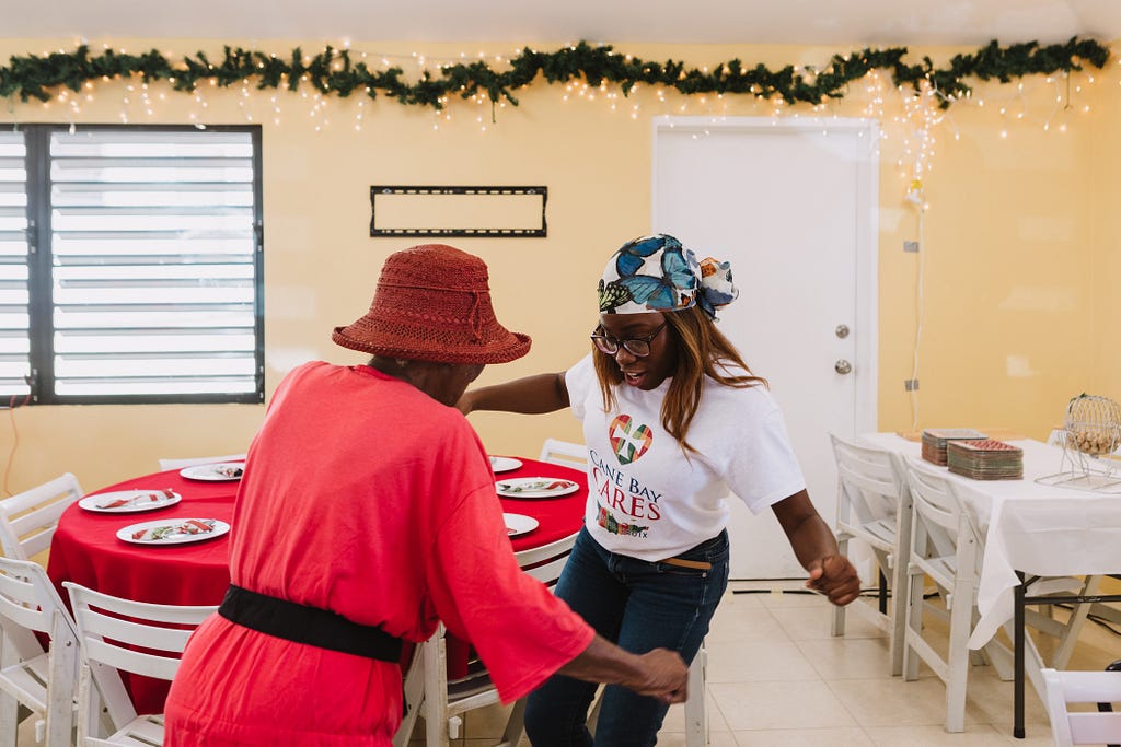 Cane Bay Cares, the charitable giving arm of Cane Bay Partners, hosts a holiday luncheon for the elderly.