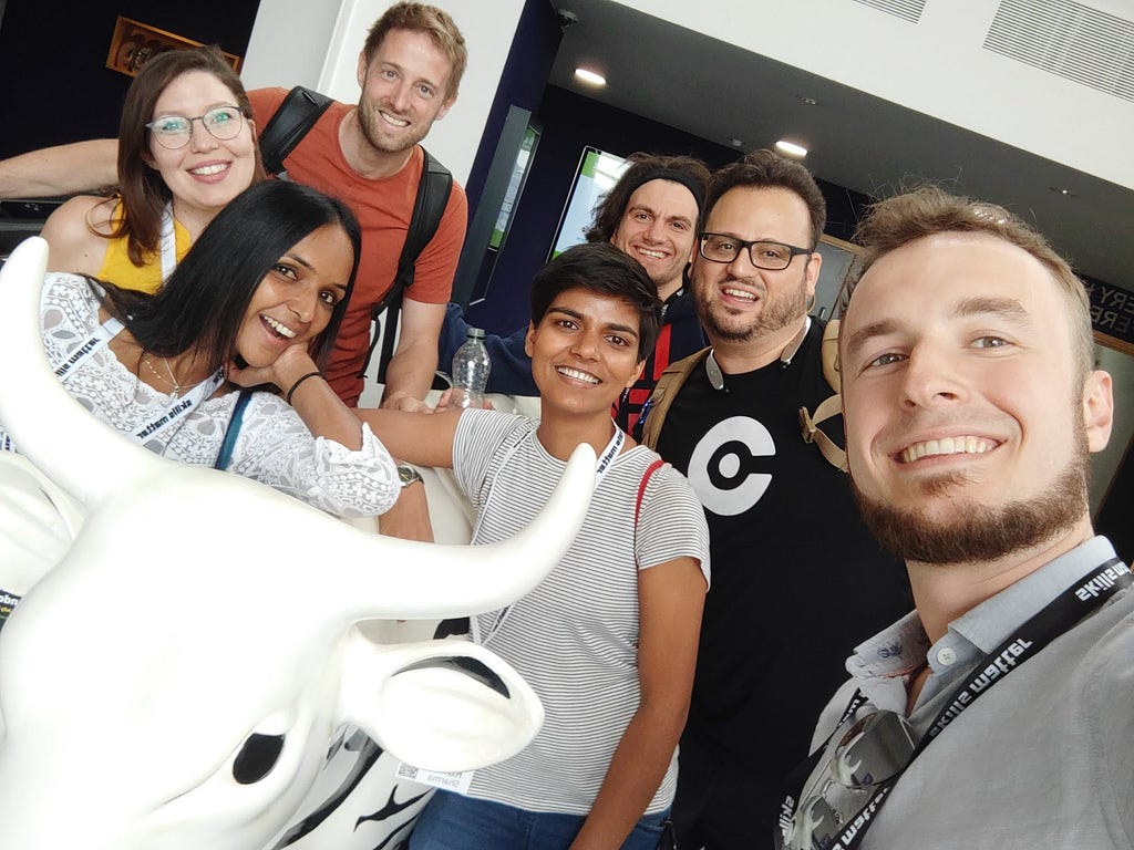 A group selfie with a cow