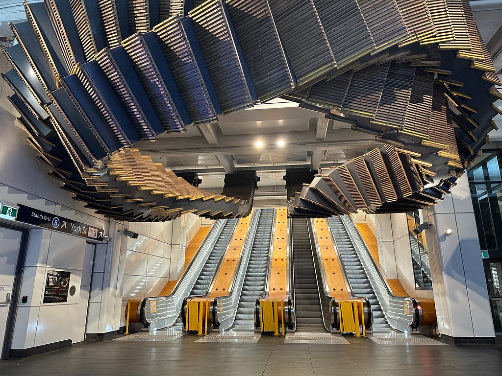 Artistic escalator of Wynyard Station in Sydney