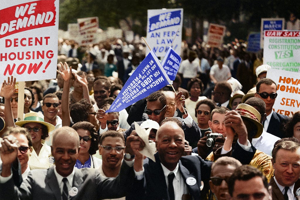 Civil Rights March on Washington, D.C. [Leaders of the march leading marchers down the street.]