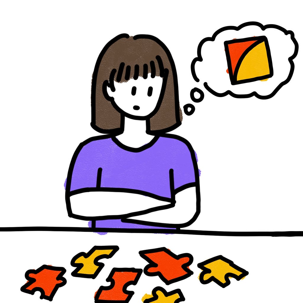 A person looking at puzzle pieces with the completed puzzle image in their mind to symbolize “thinking about the bigger picture”