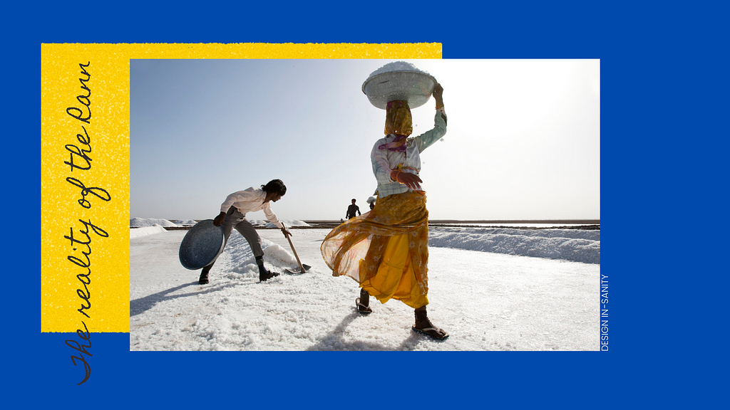 Image showing salt farmers, or Agariyas, working on the salt fields.