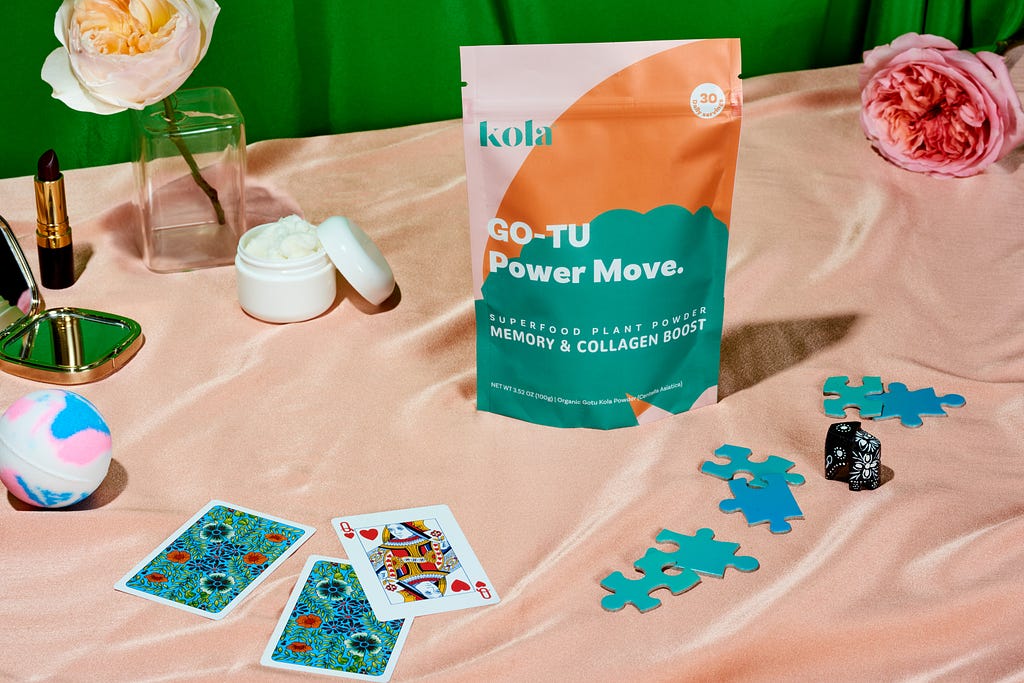 Kola Goodies GO-TU Power Move pouch with puzzles, playing cards, sri lankan elephant, beauty accessories and flowers