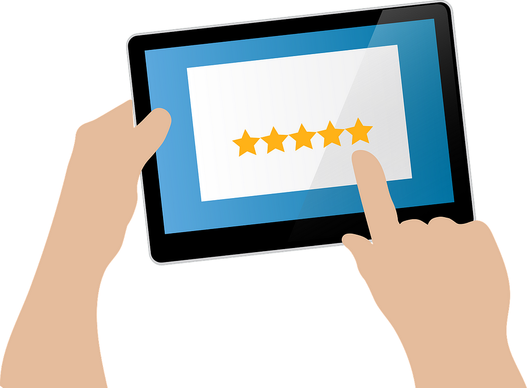 A user providing a 5-Star review for a business on their tablet device