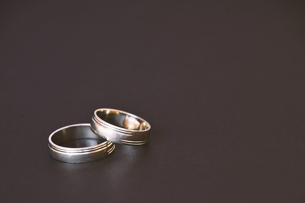 man and woman rings