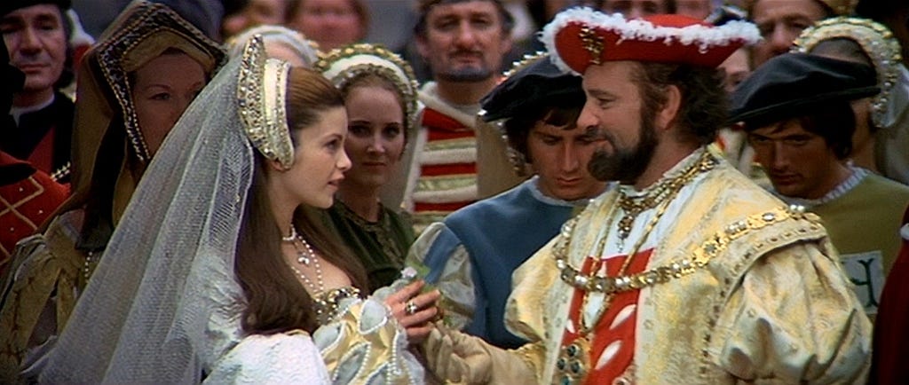 Actors Genevieve Bujold and Richard Burton opulently costumed as Anne Boleyn and King Henry VIII in the 1969 film ‘Anne of the Thousand Days’.
