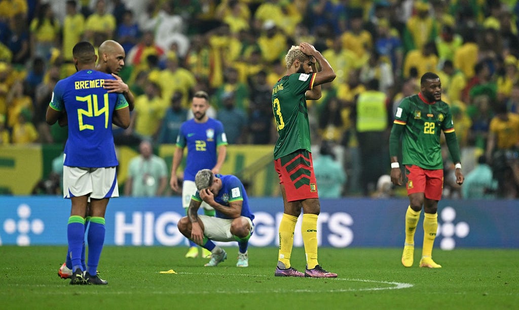 photo of Cameroon players during Brazil game