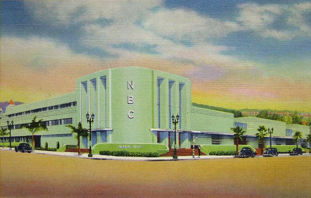 Historic postcard showing NBC studios on Vine Street in Hollywood, a modernist office building.