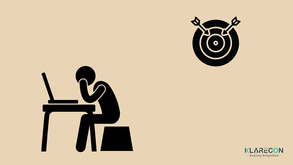 An animated image of a freelancer who’s struggling to be successful. On the right-hand side is a dartboard with missed goals.