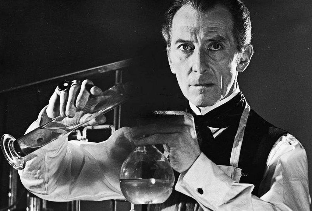 Dr. Frankensein mixing chemicals in preparation to create life. He has an intense look on his face.