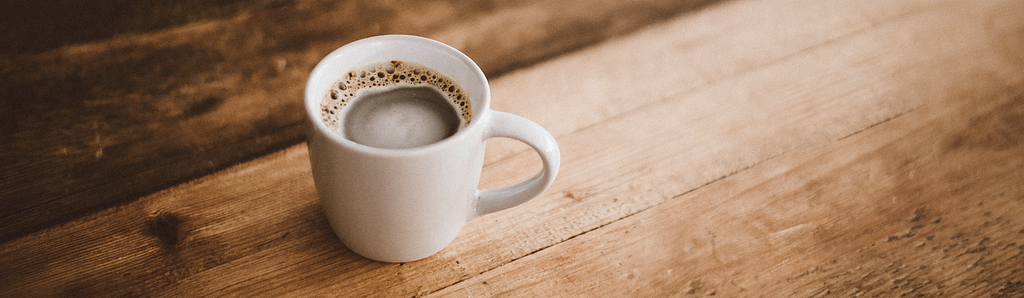 Coffee cup on a wooden table