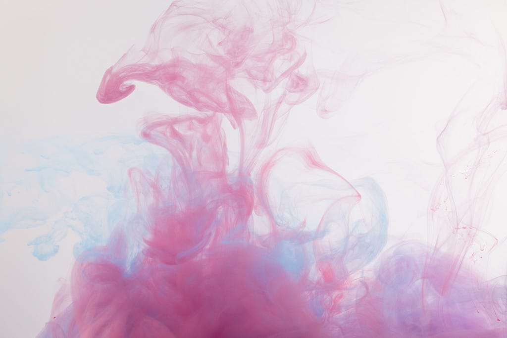 Pink and Blue Smoke on Air. Photo by Engin Akyurt